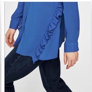 Zara blue button down shirt with ruffle on bottom L
